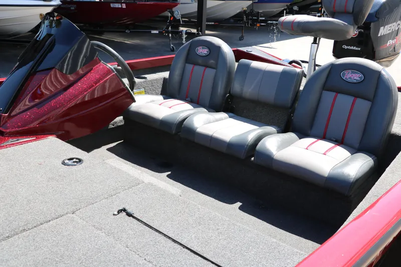 Slide: The Image of 2016 Ranger RT 188 boat interior with gray and red seating. - 13