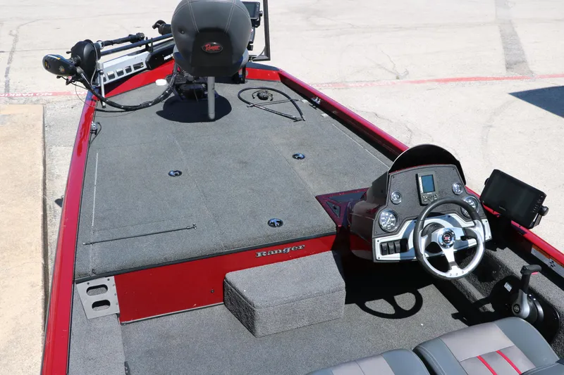 Slide: The Image of 2016 Ranger RT 188 boat interior with steering console and fishing deck. - 15