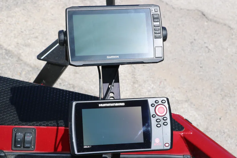 Slide: The Image of Fishfinder and GPS units on a 2016 Ranger RT 188 boat dashboard. - 18