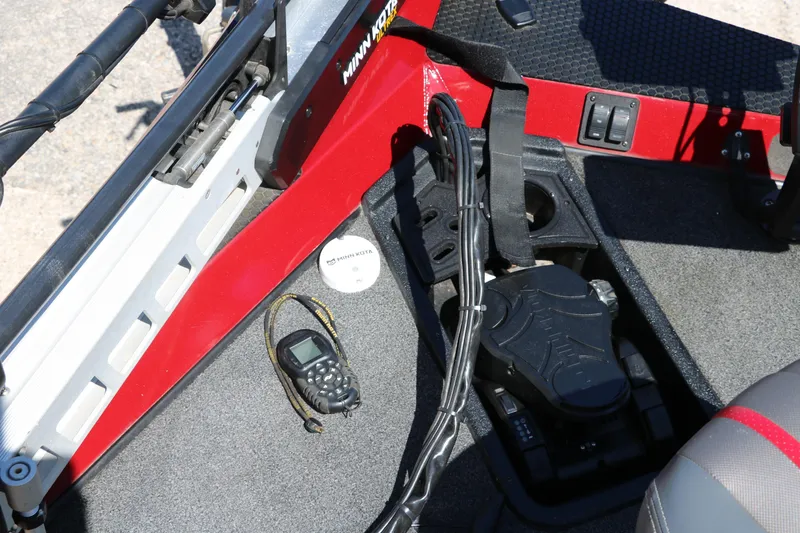 Slide: The Image of 2016 Ranger RT 188 boat interior with Minn Kota trolling motor and handheld device. - 20