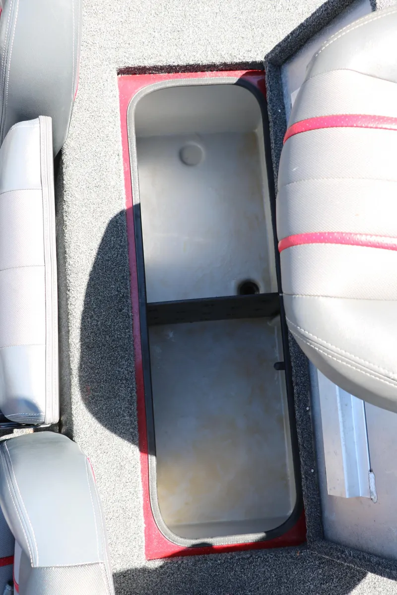 Slide: The Image of 2016 Ranger RT 188 boat storage compartment with gray and red seating. - 26