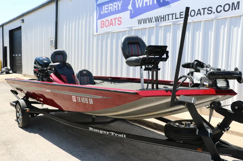 Slide: The Image of 2016 Ranger RT 188 fishing boat on trailer, parked outside dealership. - 5
