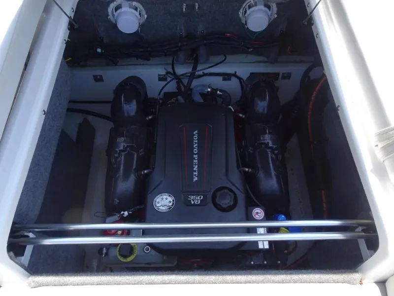 Slide: The Image of Engine compartment of 2023 Four Winns H260 boat with Volvo Penta 350 V8 engine. - 25