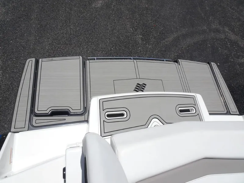 Slide: The Image of 2023 Four Winns H260 boat deck with sleek, modern design and textured surface. - 8