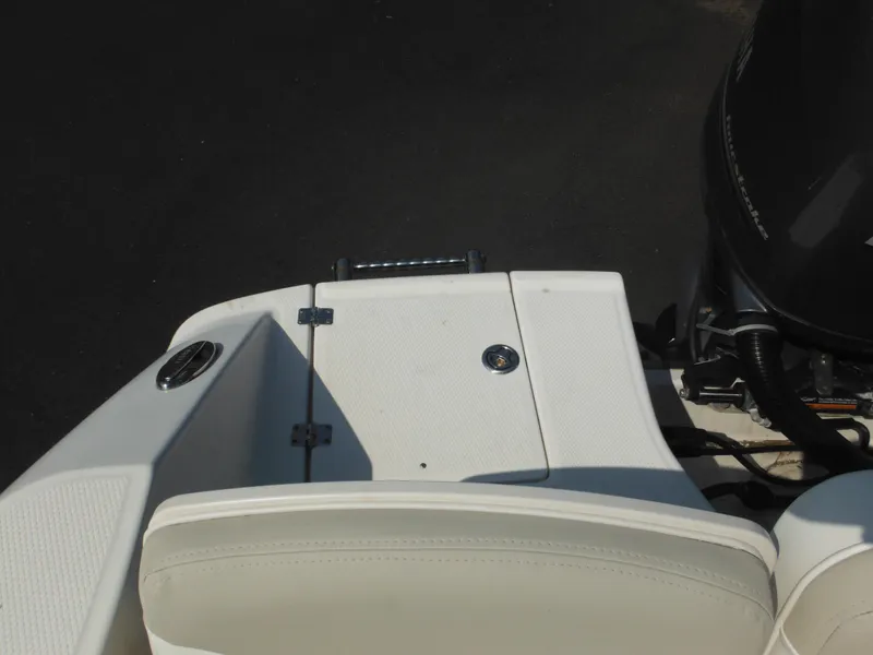 Slide: The Image of 2013 Robalo R207 Dual Console boat stern with motor and seating. - 18