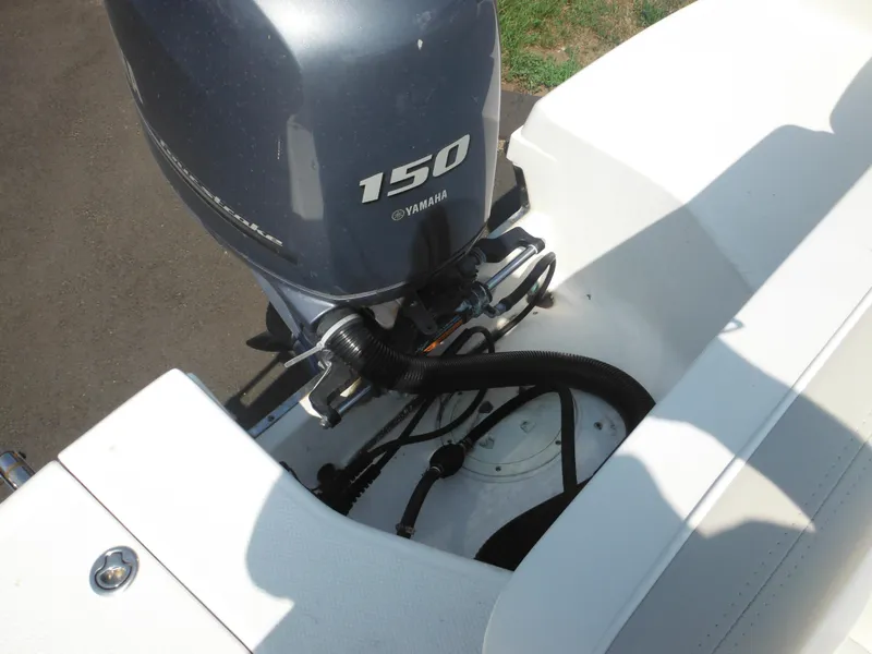 Slide: The Image of 2013 Robalo R207 Dual Console with Yamaha 150 outboard motor. - 20