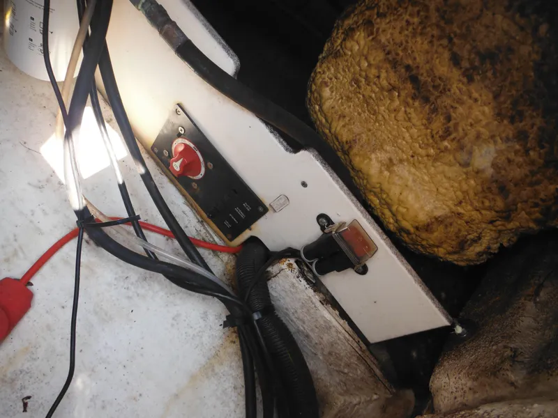 Slide: The Image of Electrical panel and wiring inside a 2013 Robalo R207 Dual Console boat. - 28