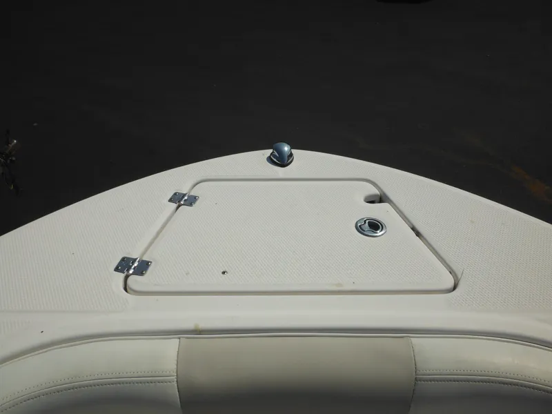 Slide: The Image of 2013 Robalo R207 Dual Console boat deck with storage compartment. - 42