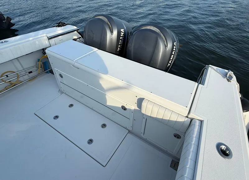 Slide: The Image of 2008 Southport 28 Express boat deck with Yamaha outboard engines on water. - 9