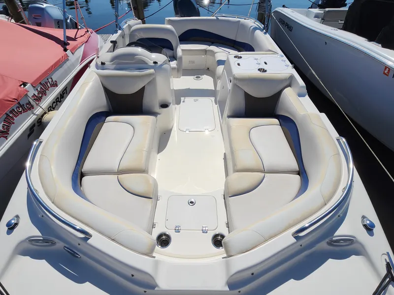 Slide: The Image of 2009 Hurricane SunDeck 2000 OB boat interior with spacious seating and sleek design. - 3