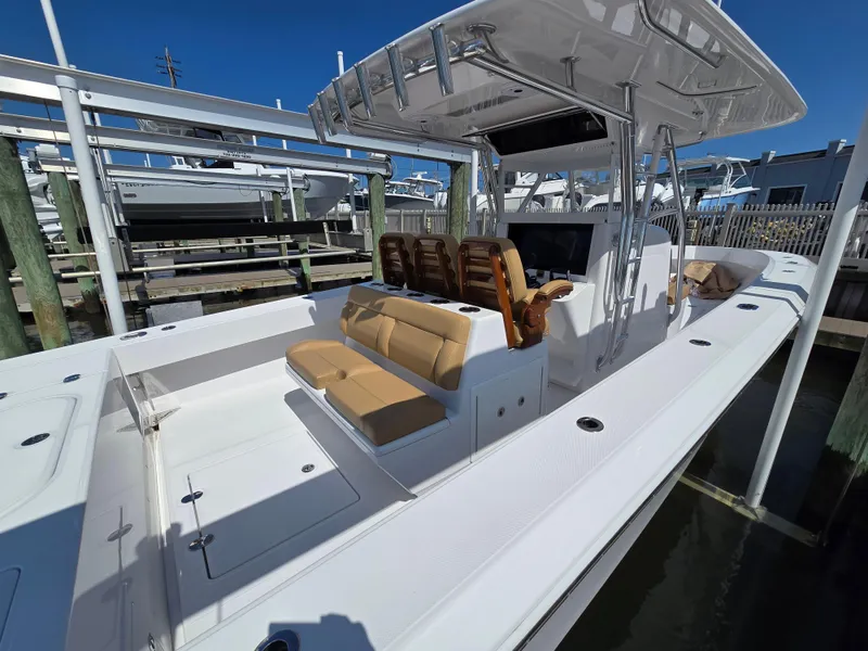 Slide: The Image of 2025 Bahama 35 Super Center Console boat with sleek design and spacious seating. - 17
