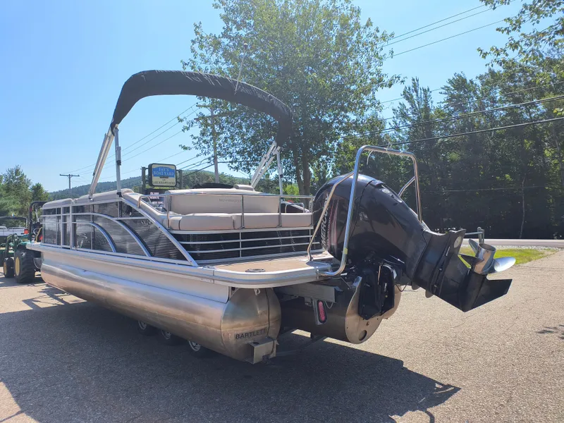 Slide: The Image of 2017 Bennington 24 SSBXP-SPS pontoon boat with outboard motor on a sunny day. - 3