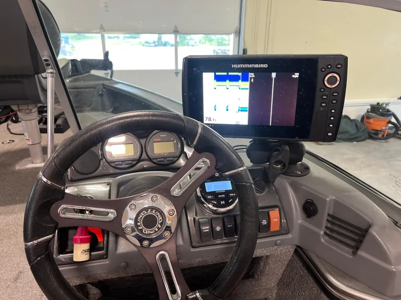 Slide: The Image of 2017 Lund 1875 Pro-V Sport dashboard with Humminbird fish finder and steering wheel. - 3