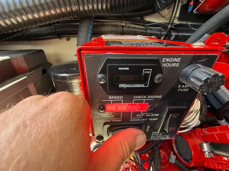 Slide: The Image of Control panel of a 2022 Regal 36 XO boat engine, showing engine hours and settings. - 10