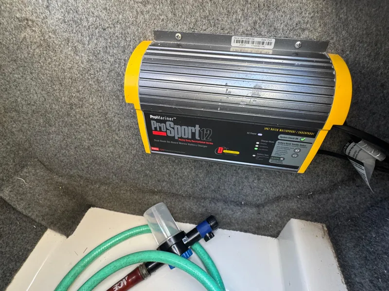 Slide: The Image of ProMariner ProSport12 charger in 2007 Sea Ray 220 Sundeck boat compartment. - 13