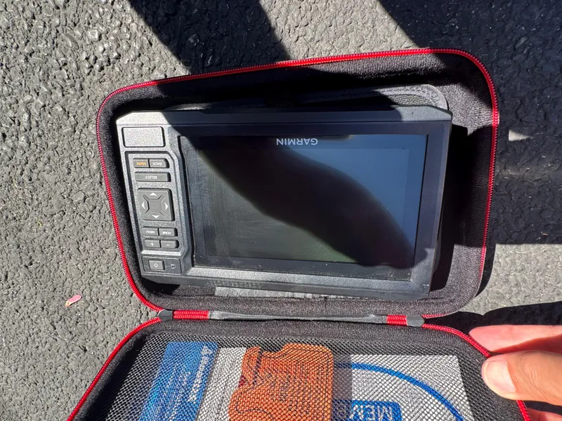 Slide: The Image of Garmin GPS device in a protective case, suitable for 2007 Sea Ray 220 Sundeck. - 17