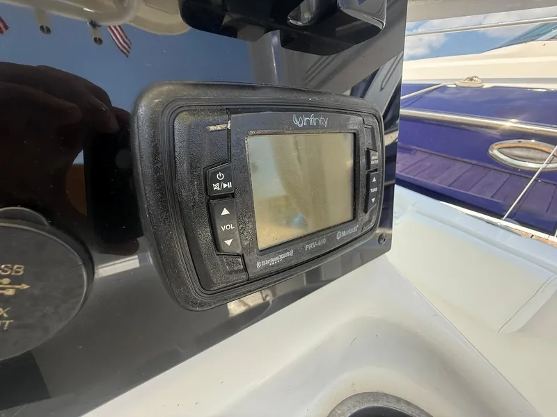 Slide: The Image of Infinity PVR-450 marine stereo on 2017 Sea Hunt Ultra 234 boat dashboard. - 16