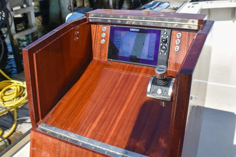 Slide: The Image of 2021 Mussel Ridge downeast boat dashboard with Simrad navigation system. - 22