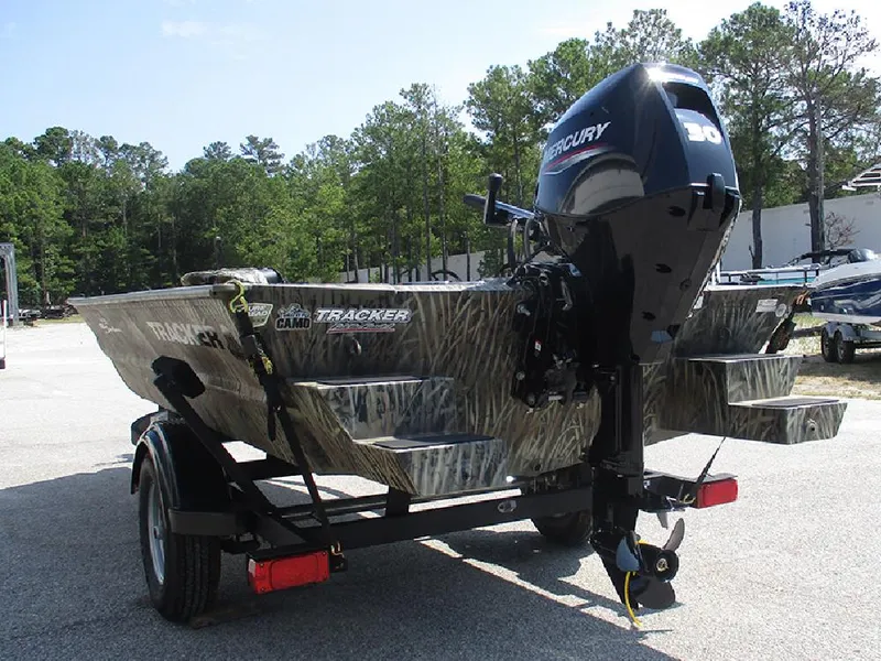Slide: The Image of 2026 Tracker Grizzly 1654 T Sportsman boat with Mercury engine on trailer. - 9