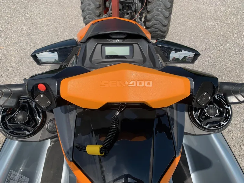 Slide: The Image of 2020 Sea-Doo GTI SE 170 dashboard with orange handlebars and control buttons. - 5