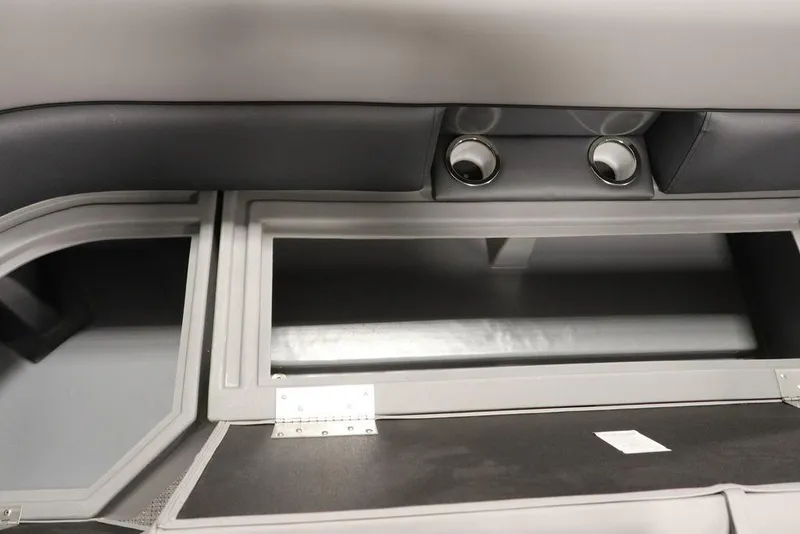 Slide: The Image of 2025 Bentley Pontoons 243 Navigator Tri-toon interior storage compartment with cup holders. - 17