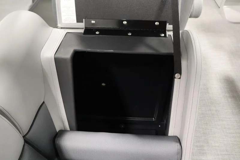 Slide: The Image of 2025 Bentley Pontoons 243 Navigator Tri-toon storage compartment with sleek interior design. - 32