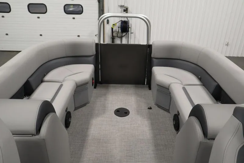 Slide: The Image of 2025 Bentley Pontoons 243 Navigator Tri-toon interior with gray seating and spacious layout. - 35