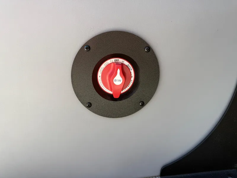 Slide: The Image of Red switch on 2026 Bentley Pontoons Legacy 223 Navigator boat panel. - 10