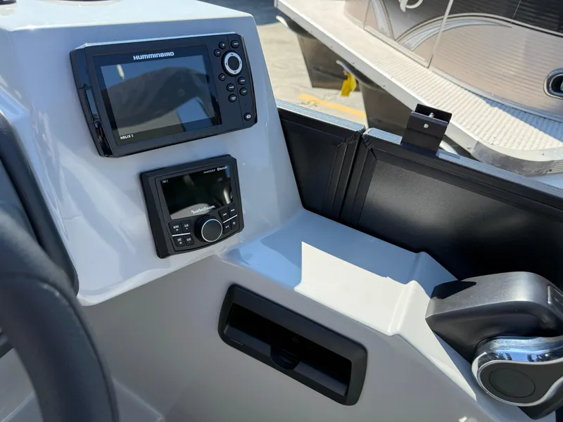 Slide: The Image of Control panel of 2026 Bentley Pontoons Legacy 223 Navigator with navigation and audio systems. - 15