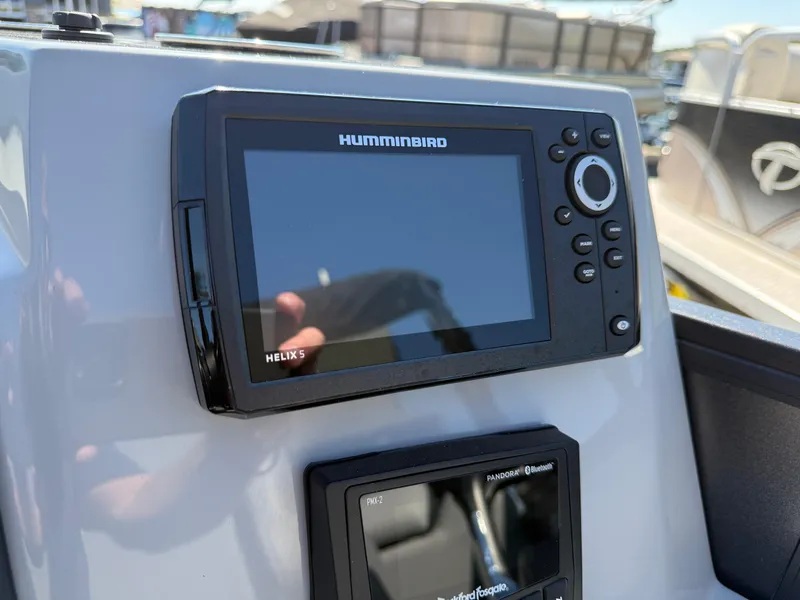 Slide: The Image of Helix 5 fish finder on 2026 Bentley Pontoons Legacy 223 Navigator dashboard. - 18