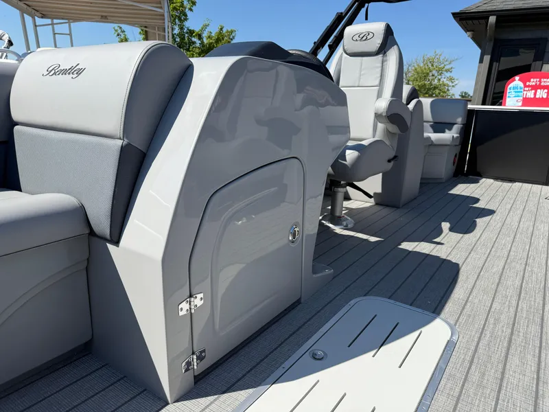 Slide: The Image of 2026 Bentley Pontoons Legacy 223 Navigator interior with sleek seating and modern design. - 22