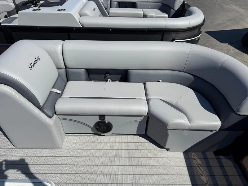 Slide: The Image of 2026 Bentley Pontoons Legacy 223 Navigator interior with luxurious gray seating. - 25