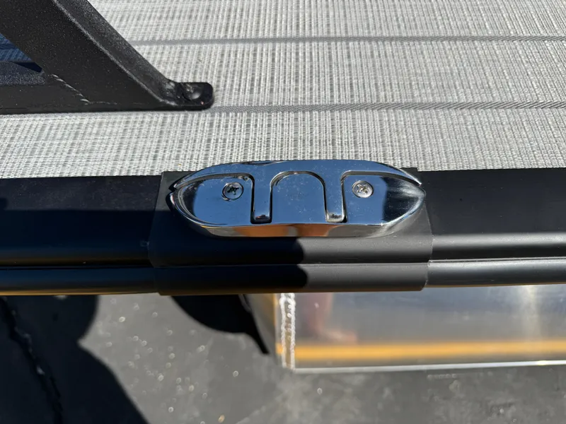 Slide: The Image of Close-up of a 2026 Bentley Pontoons Legacy 223 Navigator deck detail. - 4