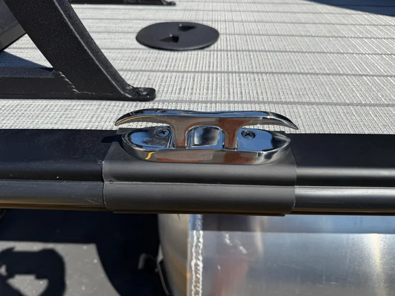 Slide: The Image of 2026 Bentley Pontoons Legacy 223 Navigator deck with chrome cleat detail. - 5