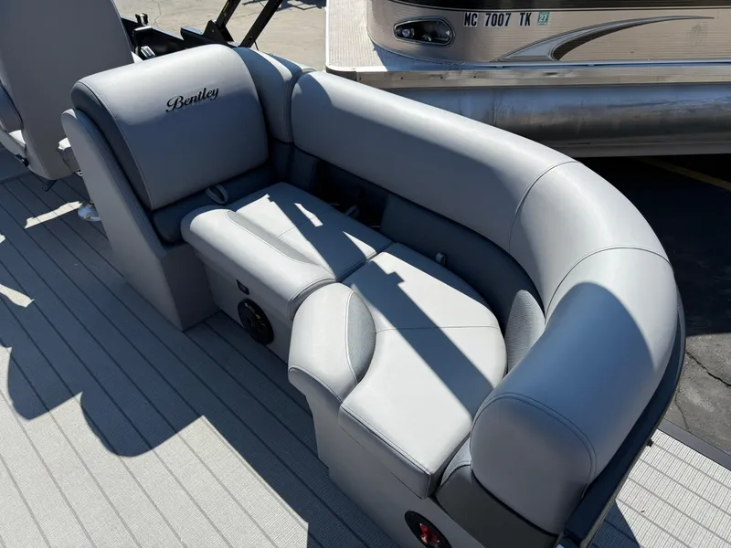 Slide: The Image of 2026 Bentley Pontoons Legacy 223 Navigator, luxurious gray seating on a pontoon boat. - 8
