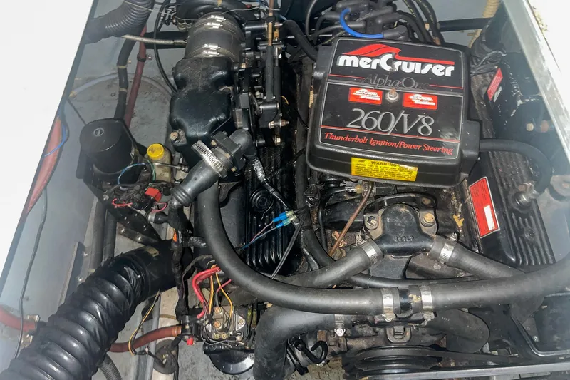 Slide: The Image of 1987 Sea Ray 300 Sundancer engine, MerCruiser 260 V8, Thunderbolt ignition, power steering. - 32