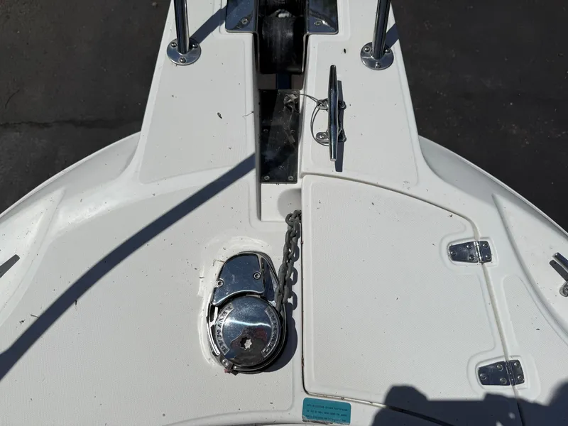 Slide: The Image of Bow of 2002 Boston Whaler 255 Conquest with anchor chain and cleat. - 27