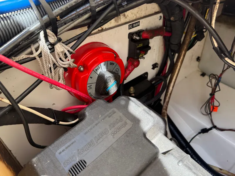 Slide: The Image of Electrical system of a 2002 Boston Whaler 255 Conquest boat, featuring battery switch. - 37