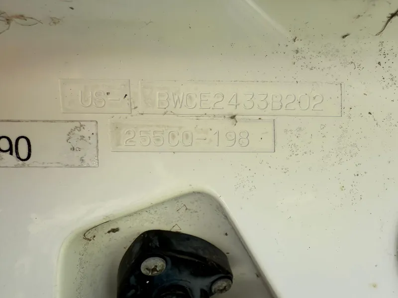 Slide: The Image of Hull identification number on a 2002 Boston Whaler 255 Conquest boat. - 47