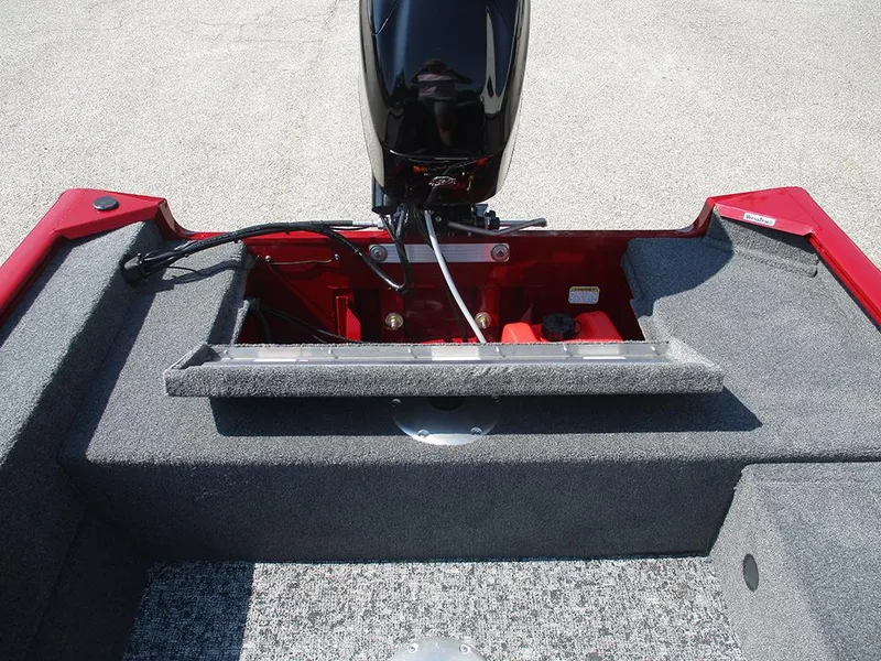 Slide: The Image of 2026 Tracker Super Guide V-16 SC boat interior with motor and storage compartment. - 10