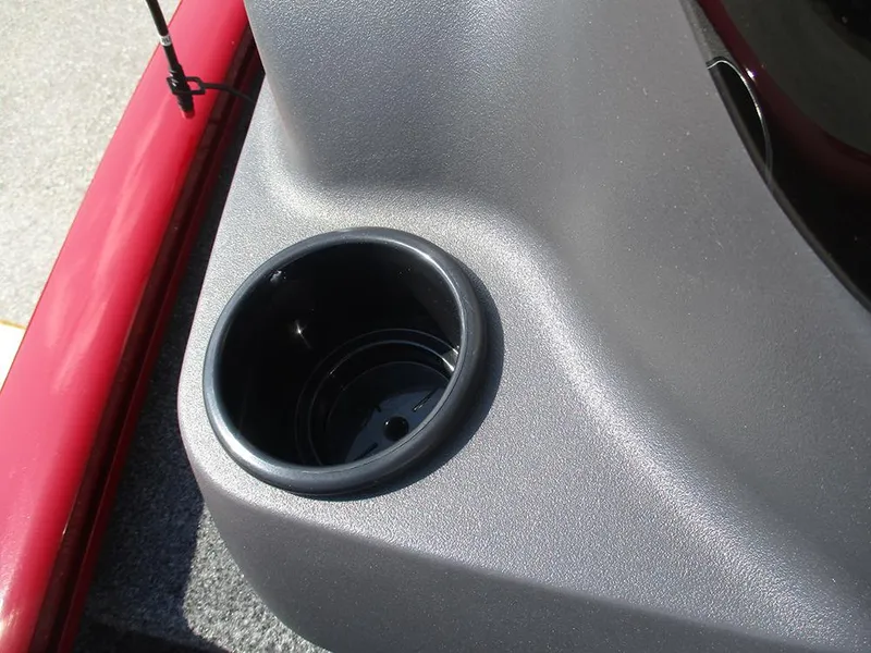 Slide: The Image of Cup holder in 2026 Tracker Super Guide V-16 SC boat, featuring sleek gray and red design. - 24