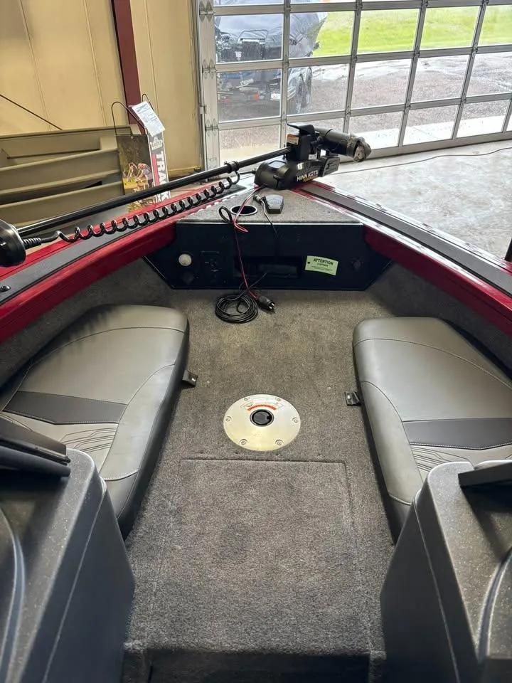 Slide: The Image of 2025 Tracker Targa V-18 Combo boat interior with seating and fishing equipment. - 6