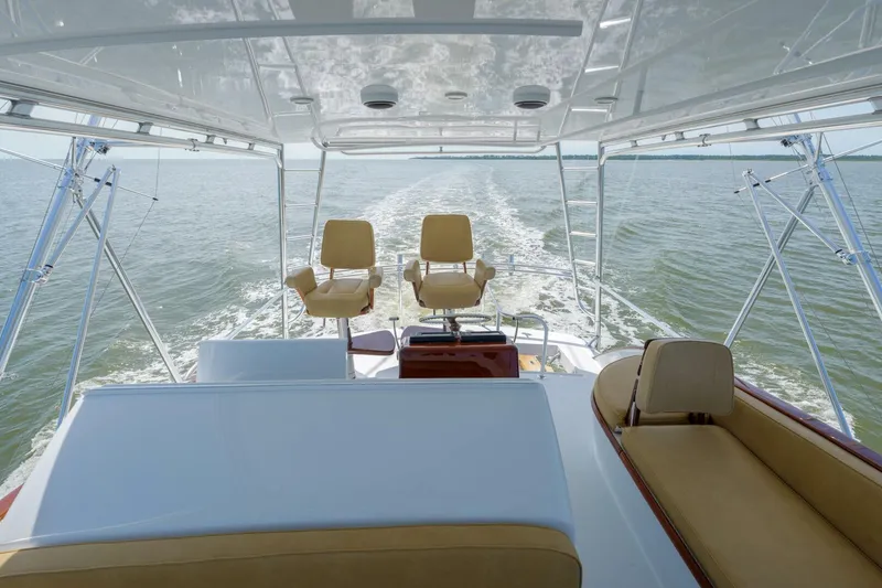 Slide: The Image of Luxury Garlington 61 C yacht interior, 2000 model, cruising on open water. - 15