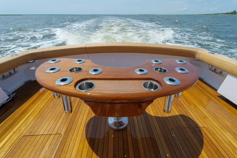 Slide: The Image of Luxury Garlington 61 C yacht deck with polished wood and ocean view, 2000 model. - 19