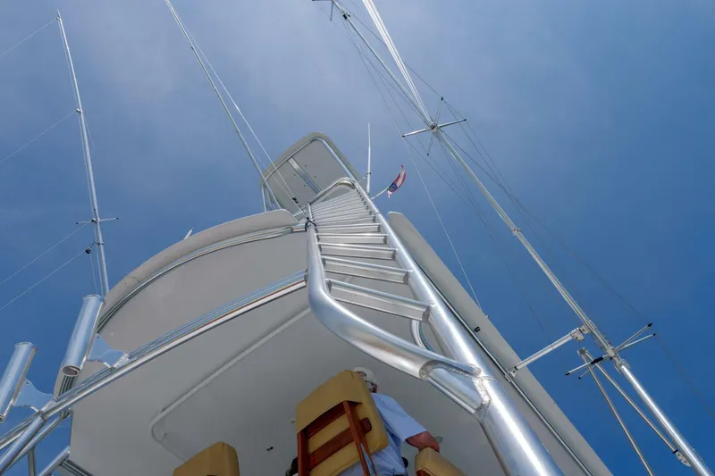 Slide: The Image of View of Garlington 61 C yacht tower and ladder against blue sky, 2000 model. - 23