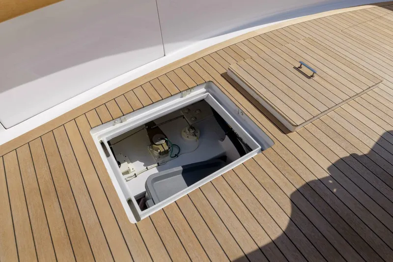 Slide: The Image of Open hatch on teak deck of 2000 Garlington 61 C yacht. - 24