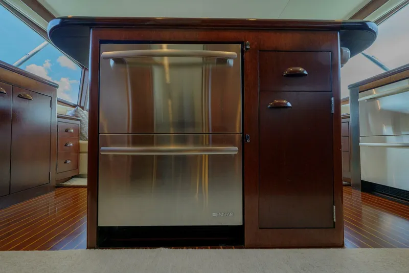 Slide: The Image of Luxurious kitchen interior on a 2000 Garlington 61 C yacht, featuring stainless steel appliances. - 38
