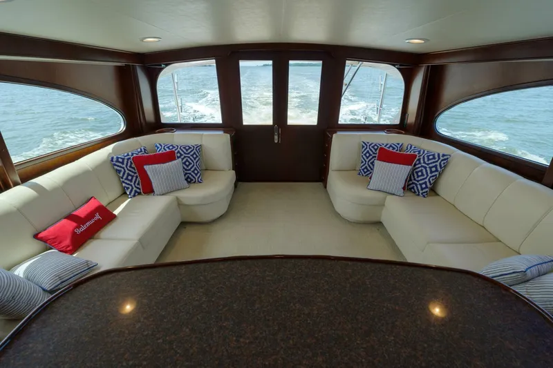 Slide: The Image of Luxurious interior of 2000 Garlington 61 C yacht with elegant seating and ocean view. - 40