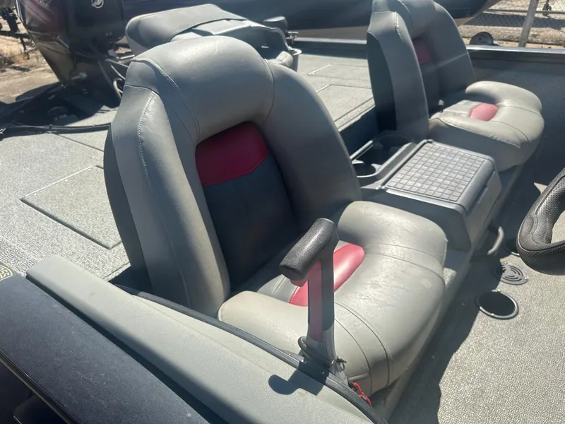 Slide: The Image of 2017 Tracker Pro Team 175 TXW boat seats with gray and red upholstery. - 4