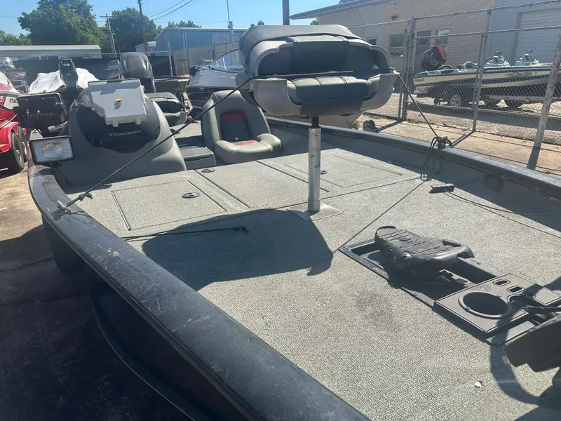 Slide: The Image of 2017 Tracker Pro Team 175 TXW fishing boat, spacious deck, parked outdoors. - 8